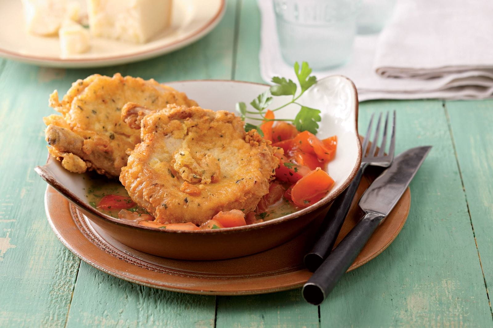 recipe image Schweinekoteletts mit Parmesanpanade